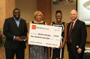 Left to right, Jonathan Smith and Valerie Banks from Wells Fargo of Cedar Hill,  Barbara Boakye and Casey Stone, Executive Director of Secondary Education