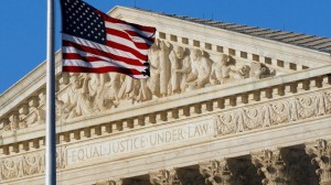 American flag flies in front of the Supreme Court in Washington in this June 27, 2012 file photo. (Alex Brandon/AP Photo)