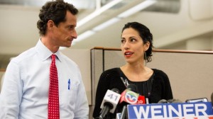 With his wife, Huma Abedin, by his side, New York mayoral candidate and former congressman Anthony Weiner confirms on July 23 that some of the sexually explicit online exchanges that were published by a gossip website happened after previous revelations forced him to resign from the U.S. House in 2011.