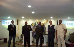  Singers are worshipping and praising God;  (L to R) Deacon Andrell Ruffin; Pastor Gregory Voss, Word of Life C.O.G.I.C, Carrollton, Texas; Elder Gregory Mason, Brother Larry Bell and Pastor Ron Rogers, Abounding Love Family Church.  The song, “Jesus Will Never Say No.”