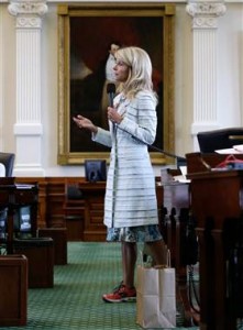 Eric Gay / AP file Sen. Wendy Davis, D-Fort Worth, filibusters in an effort to stamp out the abortion bill, June 25, in Austin, Texas. 
