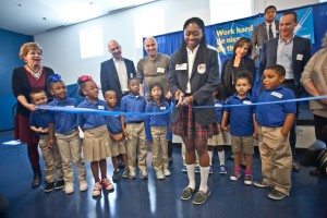 KIPP TRUTH Academy Alumna Nadia Jones cuts the ribbon to celebrate the opening of KIPP Destiny Elementary, the latest investment of the Canyon-Agassi Charter School Facilities Fund.