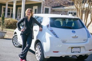 Nissan's 99,999th LEAF customer Amy Eichenberger of Charlottesville, Va., chose to go electric because of LEAF's modern style and smooth drive.  (PRNewsFoto/Nissan North America)