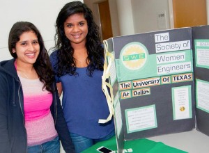 At last year's Engineers Week, Society of Women Engineers at UTD officers Aakriti Gupta (left) and Minal Issac recruited students to attend seminars encouraging female students.