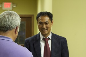 Sung recently speaking with a voter.