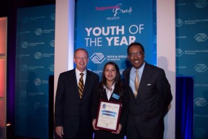 Cecilia Garza is shown with Jim Clark, the President of the Boys & Girls Clubs of America and Charles English, President of Boys & Girls Clubs of Greater Dallas.