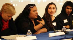 Valerie Klinker (center), a NAM videographer, presents a short film as part of a panel on youth depression.On the left is Sonya Mann, and on the right are Amber Cavarlez and Robert Cervantez. (photo credit: Zoe Kaiser)