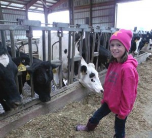 Young farmer following in the footsteps of her family. 