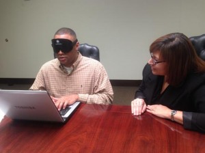 Congressman Marc Veasey (TX-33) wears a blindfold while participating in blind-sensitivity training led by employees of Lighthouse for the Blind of Fort Worth on Tuesday, October 14, 2014. (Photo courtesy of Lighthouse for the Blind of Fort Worth)