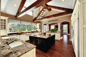 Traditional: The architectural and top-to-bottom details are crucial to the design of this kitchen. From the beams and archways to the mullion cabinet doors and island legs, this kitchen portrays every aspect of traditional. (Family Features)