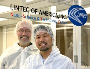Dr. Ray Baughman (left), director of the Alan G. MacDiarmid NanoTech Institute at UT Dallas, and Dr. Kanzan Inoue MS’01 PhD’05 wear protective gear while inside the “clean room” at the Nano-Science & Technology Center in Richardson. Inoue is the director of the new center. 