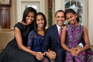 President Barack Obama, First Lady Michelle Obama, and their daughters, Sasha and Malia, sit for a family portrait in the Oval Office, Dec. 11, 2011. (Official White House Photo by Pete Souza)