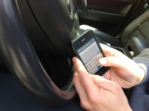 Texting, posting and emailing while driving. photo source: wikimedia.org