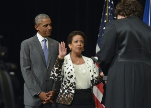 Loretta Lynch being sworn in by Associate Supreme Court Justice Sonia Sotomayor as President Obama looks on (NNPA Photo by Freddie Allen) 