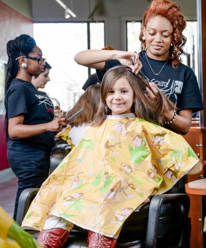 Remington College Dallas Campus provides free back-to-school haircuts in August