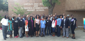 Alumni of Lincoln High School were on hand to welcome students back to school on August 25, 2015. 