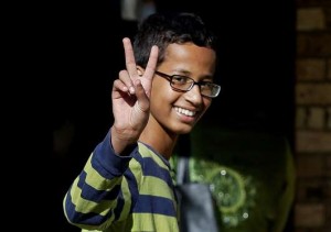 Ahmed Mohamed, 14, gestures as he arrives to his family's home in Irving, Texas, Thursday, Sept. 17, 2015. Ahmed was arrested Monday at his school after a teacher thought a homemade clock he built was a bomb. image: thenation.com