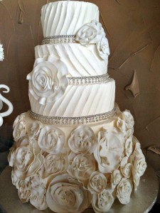 The Alfred Angelo Dress Cake is one of many custom designed wedding cakes that keeps customers coming back to Annie’s Culinary Creations