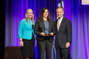 Young Professional Athena winner Lauren Mutti (center) with Stacy Nahas, Partner at KPMG, and Dale Petroskey, President and CEO of the Dallas Regional Chamber.