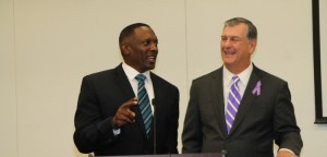 Pro football hall of famer Tim Brown with Dallas Mayor Mike Rawlings. image: thehub.dallasisd.org/ 