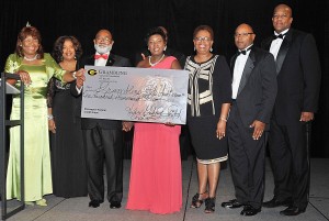Grambling University Foundation presents President Willie Larkin with a donation of $100,000 for scholarships and university programs at Grambling State University during the Red River Classic Gala on Nov. 6. Pictured from left to right are: Helen Godfrey-Smith, Sarah Dennis, President Willie Larkin, Vivian Larkin, Otto Meyers, III, Janet Barnes, Richard Rayford and David Aubrey.