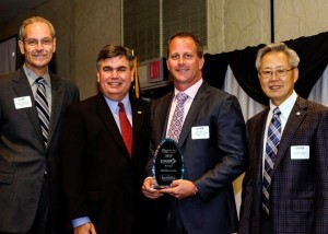 Pictured is Chamber 2016 Chairman of the Board Ken Hutchenrider, Mayor Paul Voelker, CEO Service King Chris Abraham, and Chamber 2015 Chairman of the Board Charlie Chen (Image: Richardson Chamber)