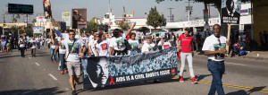 AHF advocates and its MLK parade contingents will continue to promote the message that “AIDS Is A Civil Rights Issue” and that access to care and treatment for HIV/AIDS should be a universal human right. (Image: AHF)