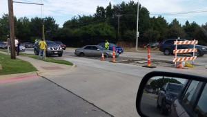 Drivers overlooking barricades can find themselves driving through wet cement. (Image: City of Plano)