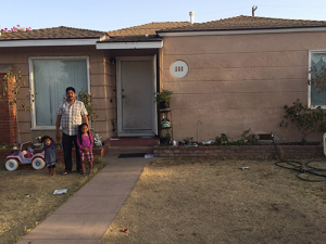Due to the drought we have refrained from watering our lawn as an attempt to save water.”— Luis Figueroa and his children, Taft. Photograph by Daniel Jimenez, 21. 