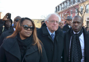 Pastor Lisa Weah and Pastor Jamal-Harrison Bryant show Sen. Bernie Sanders the impoverished conditions of Baltimore's Sandtown, where Freddie Gray grew up and where he was arrested, leading to his death. PHOTO: Freddie Allen/AMG/NNPA News Wire 