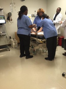 DCCCD nursing student Ivonne Loya assists with delivery in El Centro's simulated lab