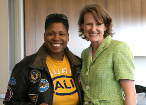 Vernice Armour (left), the U.S. Marine Corps' first African-American female combat pilot, meets with Lisa McNeme, assistant director of the Veteran Services Center at UT Dallas. McNeme was a B-52 pilot in the Air Force. (Image: UT Dallas)