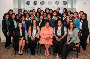 Front Row, left to right, Interactive workshop presenters Keara Richardson, President of KOR Values, (“Dress for Success”), and Shanice Parker, CEO, Blitz Productions, (“Social Networking: “Brand You””) are joined by Avalyn Simon, President, New York Coalition of One Hundred Black Women; Cecilia Nelson, Assistant Vice President of Diversity & Inclusion and Cheryl Green-Foster, Second Vice President – Programs, NYCOBW, surrounded by Role  Model 2016 students at L’Oréal USA headquarters. (Courtesy photo)