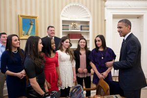 President Barack Obama talks with members of the 2012 U.S. Olympic gymnastics teams in the Oval Office, Nov. 15, 2012. Pictured, from left, are: Steven Gluckstein, Savannah Vinsant, Aly Raisman, Gabby Douglas, Steve Penny, USA Gymnastics President, McKayla Maroney, Kyla Ross, and Jordyn Wieber. (Official White House Photo by Pete Souza) This official White House photograph is being made available only for publication by news organizations and/or for personal use printing by the subject(s) of the photograph. The photograph may not be manipulated in any way and may not be used in commercial or political materials, advertisements, emails, products, promotions that in any way suggests approval or endorsement of the President, the First Family, or the White House.Ê
