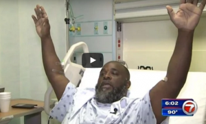 Charles Kingsley from hospital bed discusses getting shot by police while unarmed and hands in the air. (Screenshot from video)