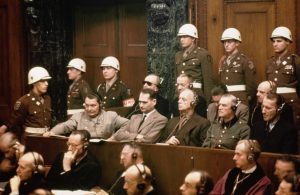 01 Jan 1946, Nuremberg, Germany --- The defendants at the Nuremberg Nazi trials.  Pictured in the front row are: Hermann Goering, Rudolf Hess,  Joachim Von Ribbentrop, Wilhelm Keitel and Ernst Kaltenbrunner.  In the back row are: Karl Doenitz, Erich Raeder, Baldur von Schirach, and Fritz Sauckel. --- Image by © Bettmann/CORBIS