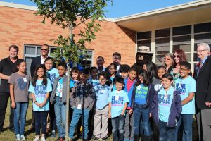 The Green Team of Barton Elementary School, alongside their advisor Jose Torres and principal Kelly Giddens, celebrate the school’s Arbor Day award given by the City of Irving and Keep Irving Beautiful on November 11.