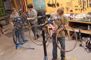 Middlebury College students who complete a free class on bicycle repair are rewarded with a free discarded bike. Credit: Robert Keren.