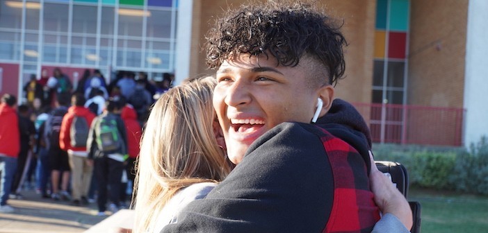 Dallas ISD students and staff celebrate a successful first day back to school after the storms