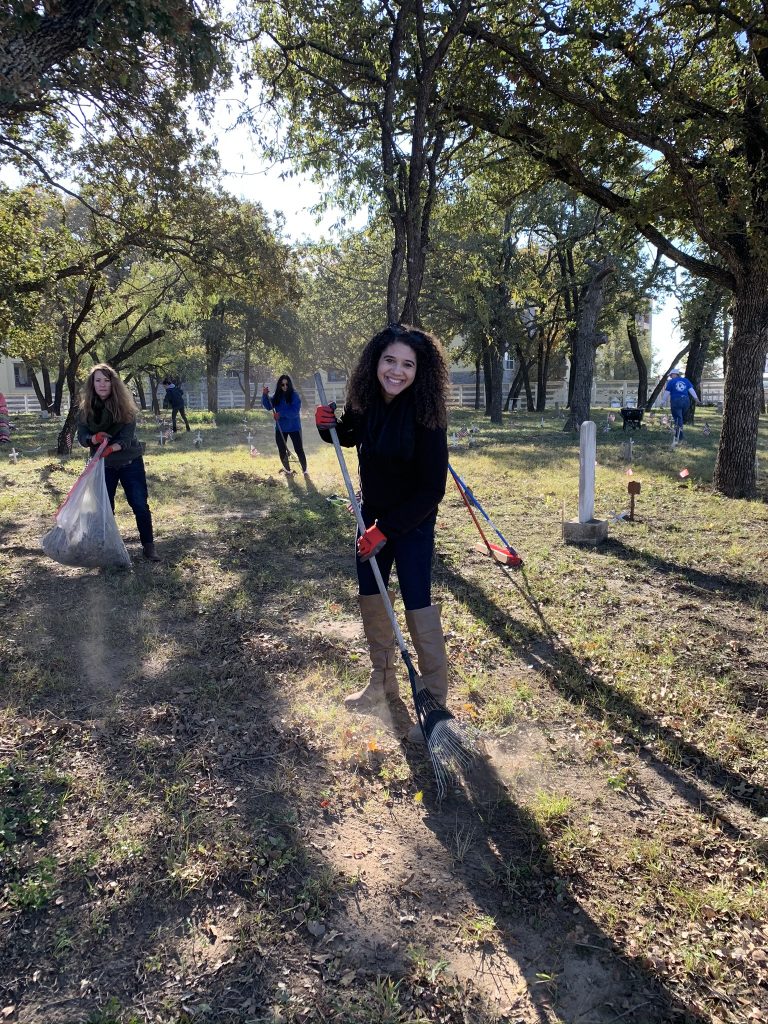 Cemetery clean-up a moving experience for Irving Redeemer Montessori staff
