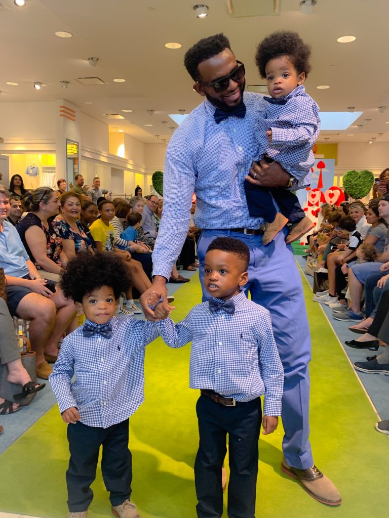 Father and sons join Neiman-Marcus fashion show for fifth appearance
