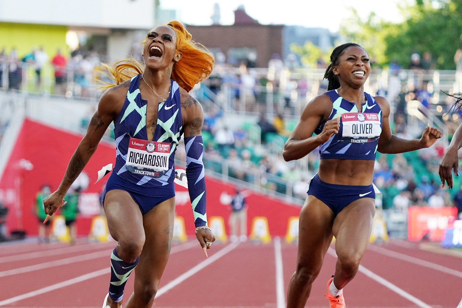 Sha’Carri Richardson (left) erupts in celebration as she crosses the finish...